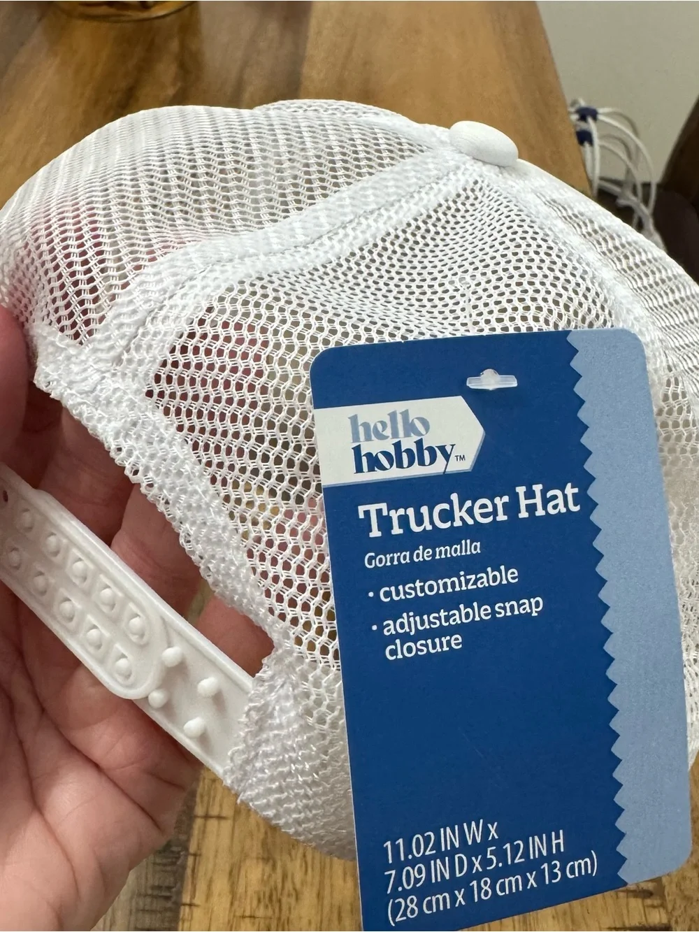 White Trucker Hat with Green Crochet Daisy Patch
